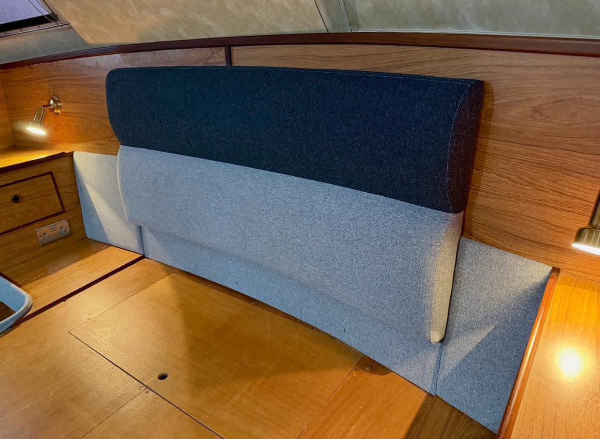 Forward cabin backrest