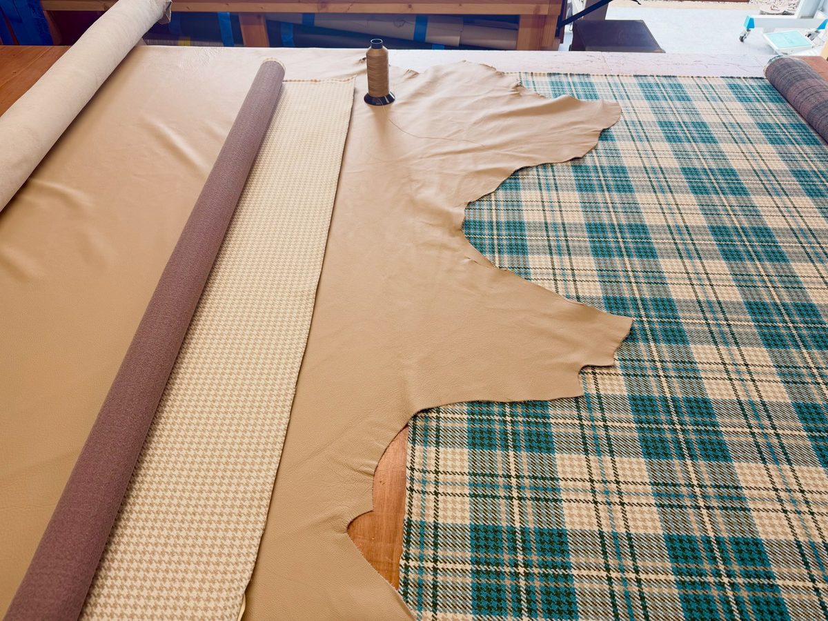 Leather and fabric rolls on the cutting table
