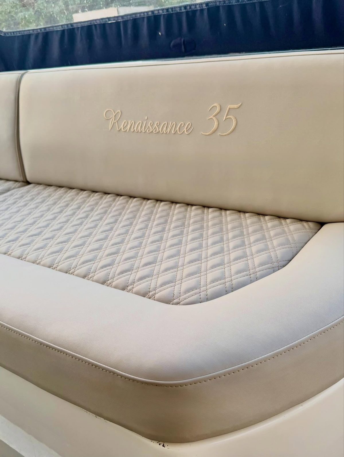 Cream diamond-stitched saloon seating embroidered Renaissance 35